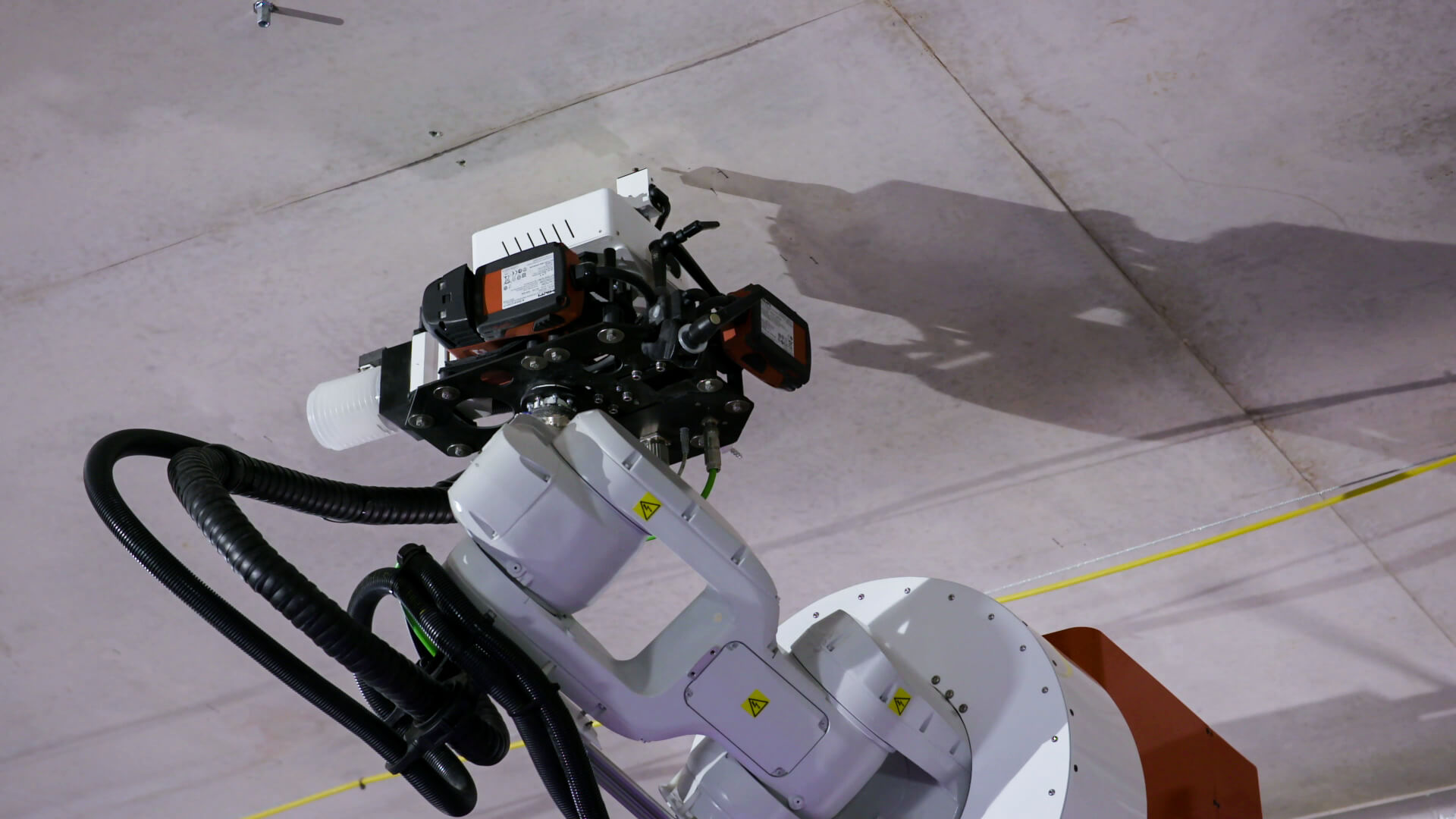 Mobile robot drilling a concrete slab